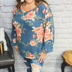 Soft teal with pink floral print. A warm, great layering too! A bit over sized.